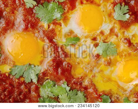 Close Up Of Rustic Middle Eastern Shakshuka Breakfast Food Background