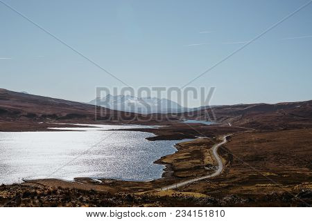 View Of The Loch Leathan And The Road From Old Man Of Storr Trek, Isle Of Skye, Scotland, Snowcapped