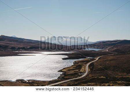 View Of The Loch Leathan And The Road From Old Man Of Storr Trek, Isle Of Skye, Scotland, Snowcapped