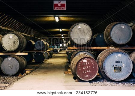 Brora, Scotland - March 22, 2018: Barrels Of Whisky Inside Brora Distillery Warehouse In Scotland, R