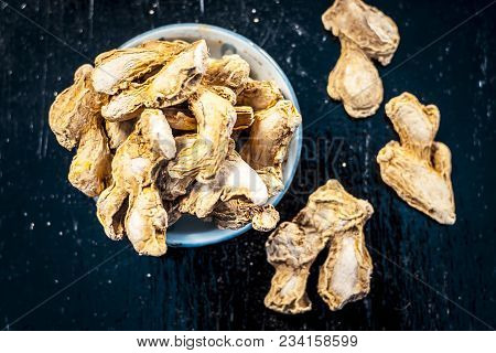 Close Up Of Ayurvedic Herb Or Folk Medicine Dried Ginger Or Zingiber Officinale In A Glass Plate On 