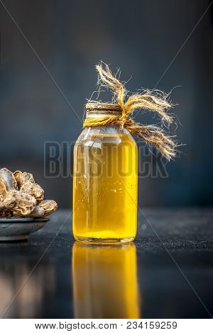 Close Up Of Ayurvedic Herb Or Folk Medicine Dried Ginger Or Zingiber Officinale With Common Cooking