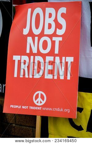 Aldermaston, United Kingdom, 1st April 2018:- Cnd Peace Banners By The Main Gate To The Awe Where Br