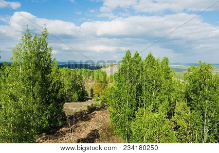 Summer Mountain Landscape. View From The Top Of The Mountain To The City Of Pervouralsk. Russia, The