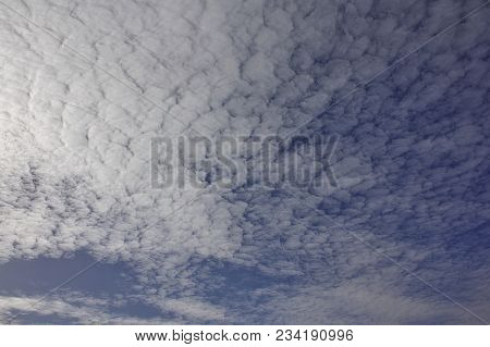 Evening Sky With Light Cirrus Clouds At Sunset