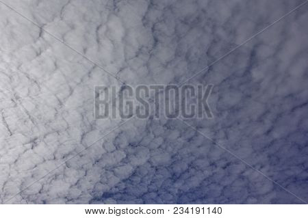 Evening Sky With Light Cirrus Clouds At Sunset