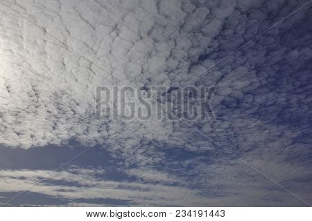 Evening Sky With Light Cirrus Clouds At Sunset