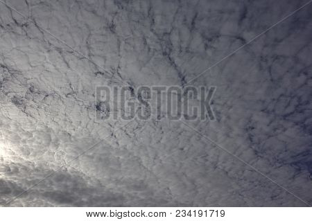 Evening Sky With Light Cirrus Clouds At Sunset