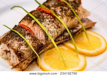 Close Up Plate With Pike Perch Fillet, Lemon, Tomato And Asparagus. Healthy Diet Concept