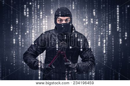 Burglar in action with encoded concept and his tools in his hand. 