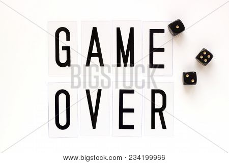 Game Over Text With Gaming Dice On White Background. Concept For Banners, Web Pages, Games, Presenta
