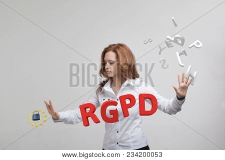 RGPD, Spanish, French and Italian version version of GDPR: Reglamento General de Proteccion de datos. General Data Protection Regulation. Young woman working with information.