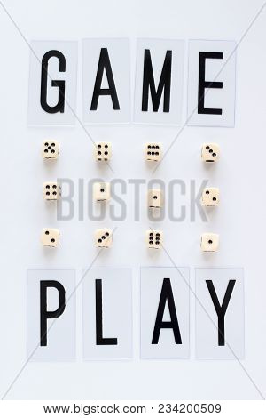 Game Play Words And Gaming Dice In Row On White Background. Concept For Banners, Web Pages, Games, G