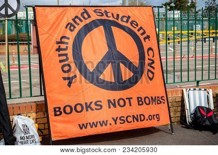 Aldermaston, United Kingdom, 1st April 2018:- Cnd Peace Banners By The Main Gate To The Awe Where Br