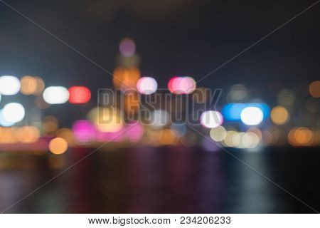 Hong Kong's Victoria Harbor And Commericial Island Illuminated In And Abstract Urban Image Of City N