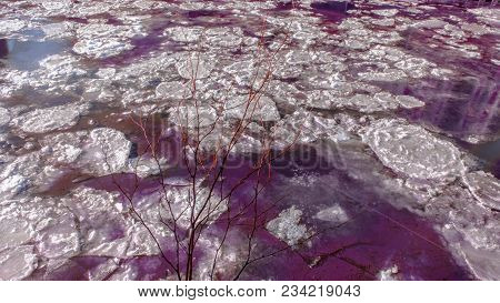 A Colorful Natural Abstraction From  The Ice On The Canal In Hamburg.spring Floes Drift