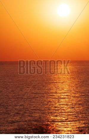 Beautiful Sunset On The Sea With Shallow Waves In Summer Hot Evening Poster Background