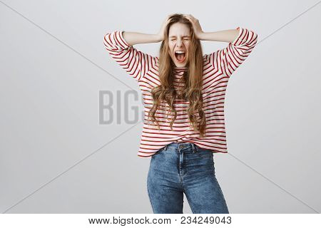 I Hate Adults. Portrait Of Depressed And Angry European Teenage Girl Screaming With Closed Eyes And 