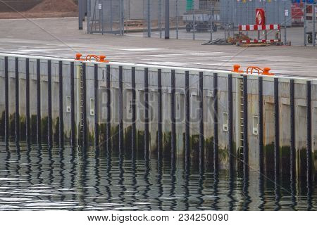 Detail Of New Modern Quay Of Concrete With Rubber Bumbers