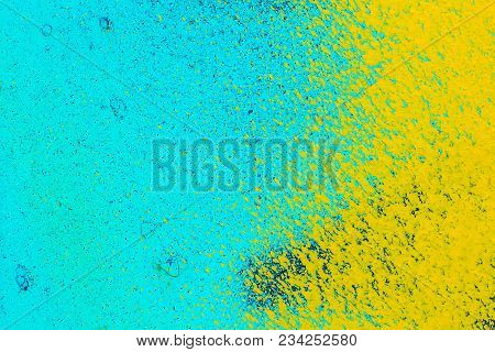 Old Metal Blue Surface With Yellow Paint. Abstract Background, Texture