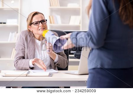 Angry boss dismissing employee for bad underperformance