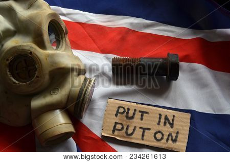 ILLUSTRATIVE EDITORIAL. The scandal about poisoning of former spy Sergei Skripal. Concept. British Flag background.March 24, 2018 in Kiev,Ukraine