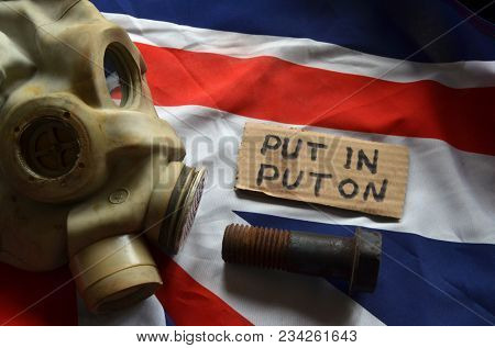 ILLUSTRATIVE EDITORIAL. The scandal about poisoning of former spy Sergei Skripal. Concept. British Flag background.March 24, 2018 in Kiev,Ukraine