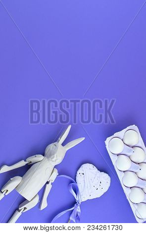 Easter Accessories For Ultraviolet Background. Easter Bunny Vintage Heart Set Of Eggs In A Box. Flat