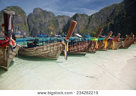 KO PHI PHI LEH, THAILAND, February 1, 2014: Overcrowded beach of Maya Bay, Andaman Sea, famous tourist destination in the Ko Phi Phi achipelago