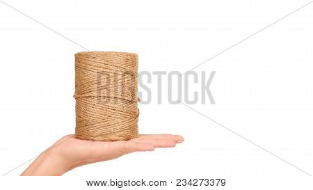 Spool Of Bale Twine Isolated In Hand On White Background. Copy Space, Template.