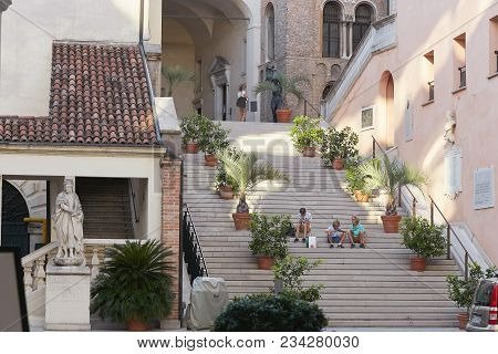 Padova, Italy - August 24, 2017: Statue Of The Old Padua Of The Xvii Century. Palazzo Moroni Seat Pa
