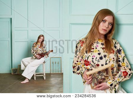 Girl With Long Hair, Long Sleeve Shirt With Floral Print And Wide White Pants. A Wistful Romantic Lo