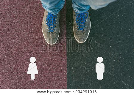 Gender Gap Between Man And Woman In Past, Now And Future Symbolized By Two Feet Standing On Two Diff