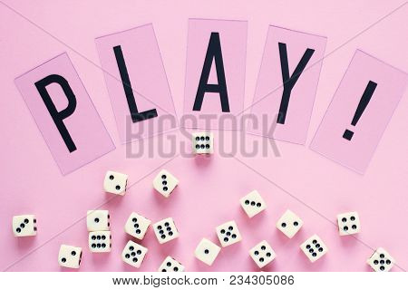 Gaming Dice With Word Play On Pink Background. Concept For Games, Game Board, Presentation, Banners 
