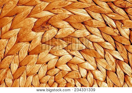 Round Straw Mat Texture In Orange Tone. Abstract Background And Texture For Design.