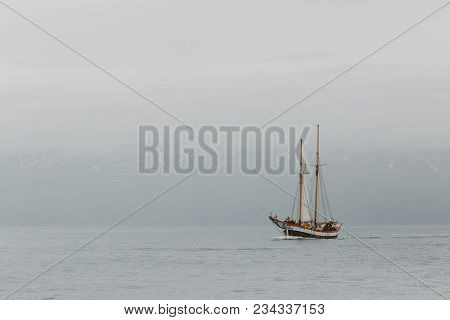 Husavik, Iceland - 20 July, 2016: Yacht Floating On Water Near Icelandic Coast, Husavik, Iceland