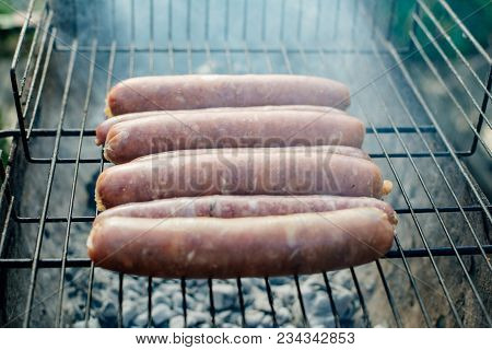 Oktoberfest. Homemade Chicken Sausages And Lamb Sausages Are Roasted On The Grill.