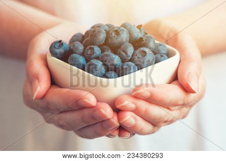 Woman Offering Blueberry Myrtilles, Fresh Ripe Organic Berry Fruit