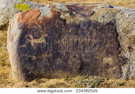Ancient Site With Petroglyphs Near Cholpon-ata,  Kyrgyzstan During Summer