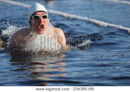 ST. PETERSBURG, RUSSIA - MARCH 4, 2018: Winter swimming competitions for Big Neva Cup. Winter swimmers from 12 countries aged from 12 to 78 take part in the competitions this year