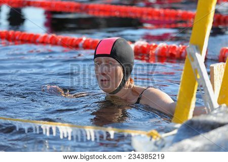 ST. PETERSBURG, RUSSIA - MARCH 4, 2018: Winter swimming competitions for Big Neva Cup. Winter swimmers from 12 countries aged from 12 to 78 take part in the competitions this year
