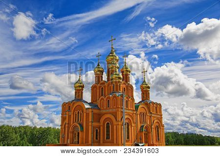 Orthodox Cathedral Against The Background Of The Majestic Sky