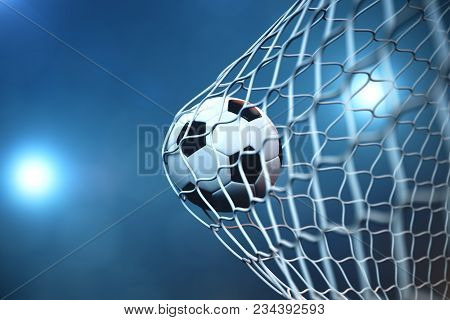 3d Rendering Soccer Ball In Goal. Soccer Ball In Net With Spotlight Or Stadium Light Background. Suc