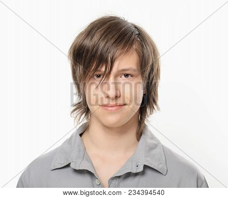 Smiling Nice Boy In Grey Shirt Smiling Portrait