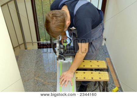 Carpenter And Saw