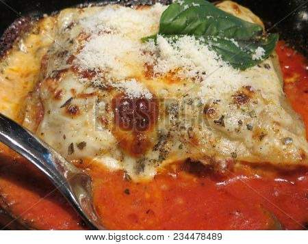 Italian Food Lasagna On A Pan Served For Dinner.