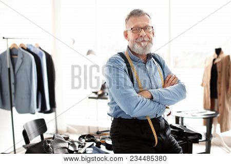 Portrait Of Professioanl Mature Tailor In Atelier