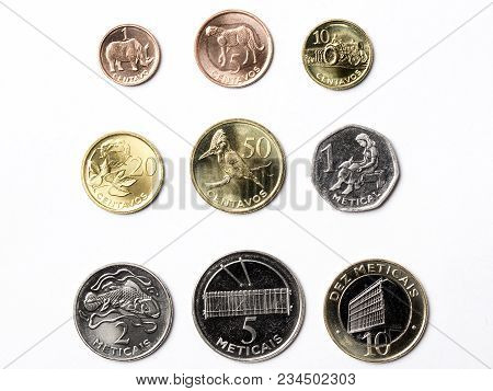 Mozambican Coins On A White Background - Metical