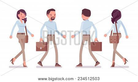 Smart Middle Aged Man And Young Woman In Buttoned Up Shirt, Camel Skinny Chino Trousers, Walking. Bu