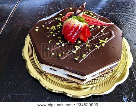 Delicious Chcocolate Cakes Covered With Sugar Icing